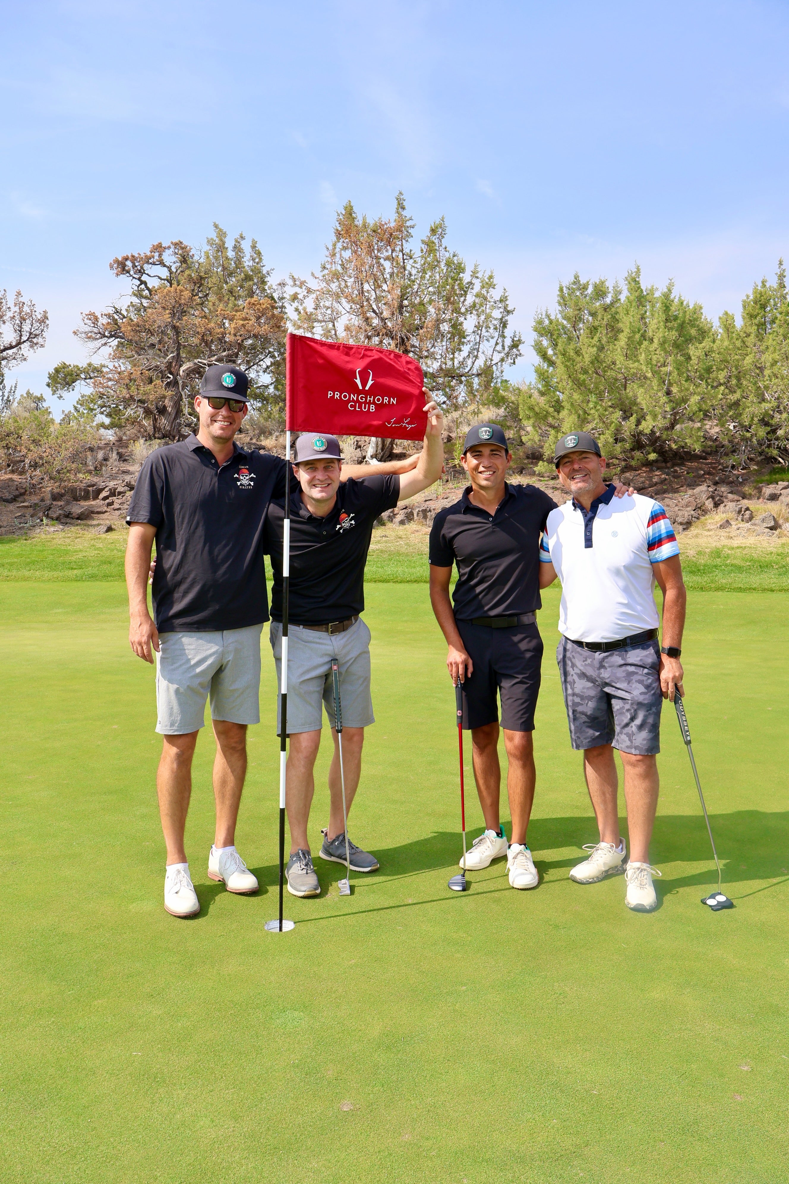Pronghorn Golf Tournament Group Photo on Greens