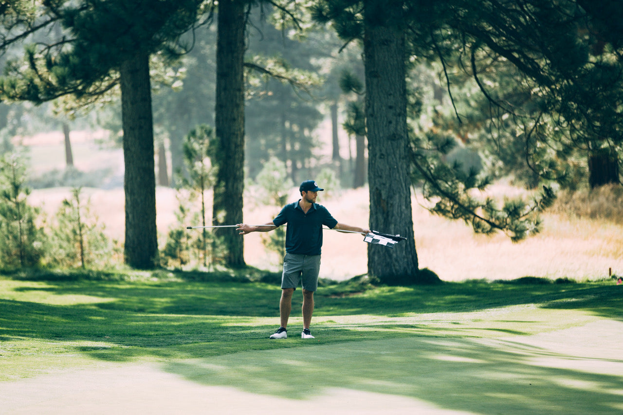 Golfer pulling the flag 