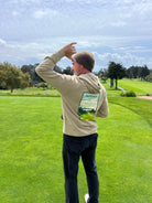 Man wearing the Ashworth Brother's  Hoodie with artwork of the Pasatiempo Golf Course