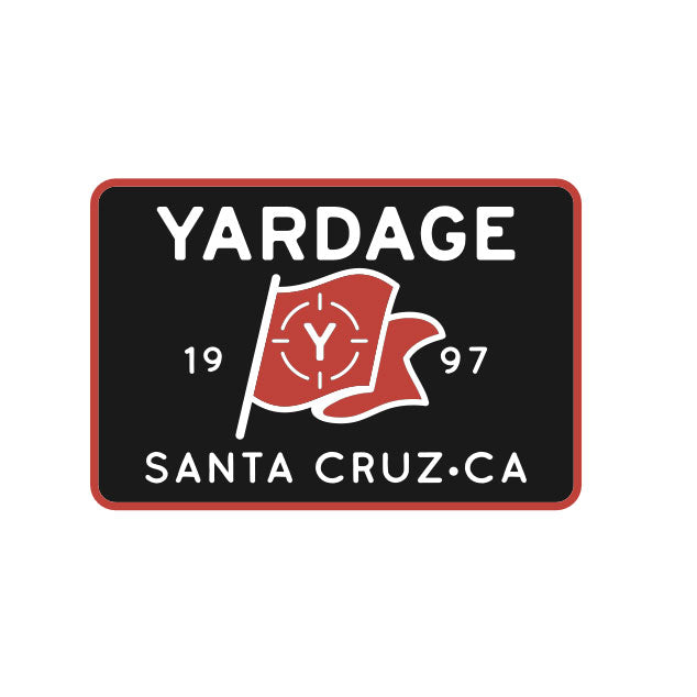 Yardage logo with a red flag and text on a black background