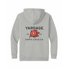 A light gray hooded sweatshirt shown from the back, featuring a black 'YARDAGE' logo and a red flag graphic with '1997' and 'SANTA CRUZ-CA' printed on the back.