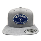 Gray and white cap with a blue 'Yardage' logo on a white background