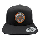 Black cap with a yardage circular logo and text on a white background