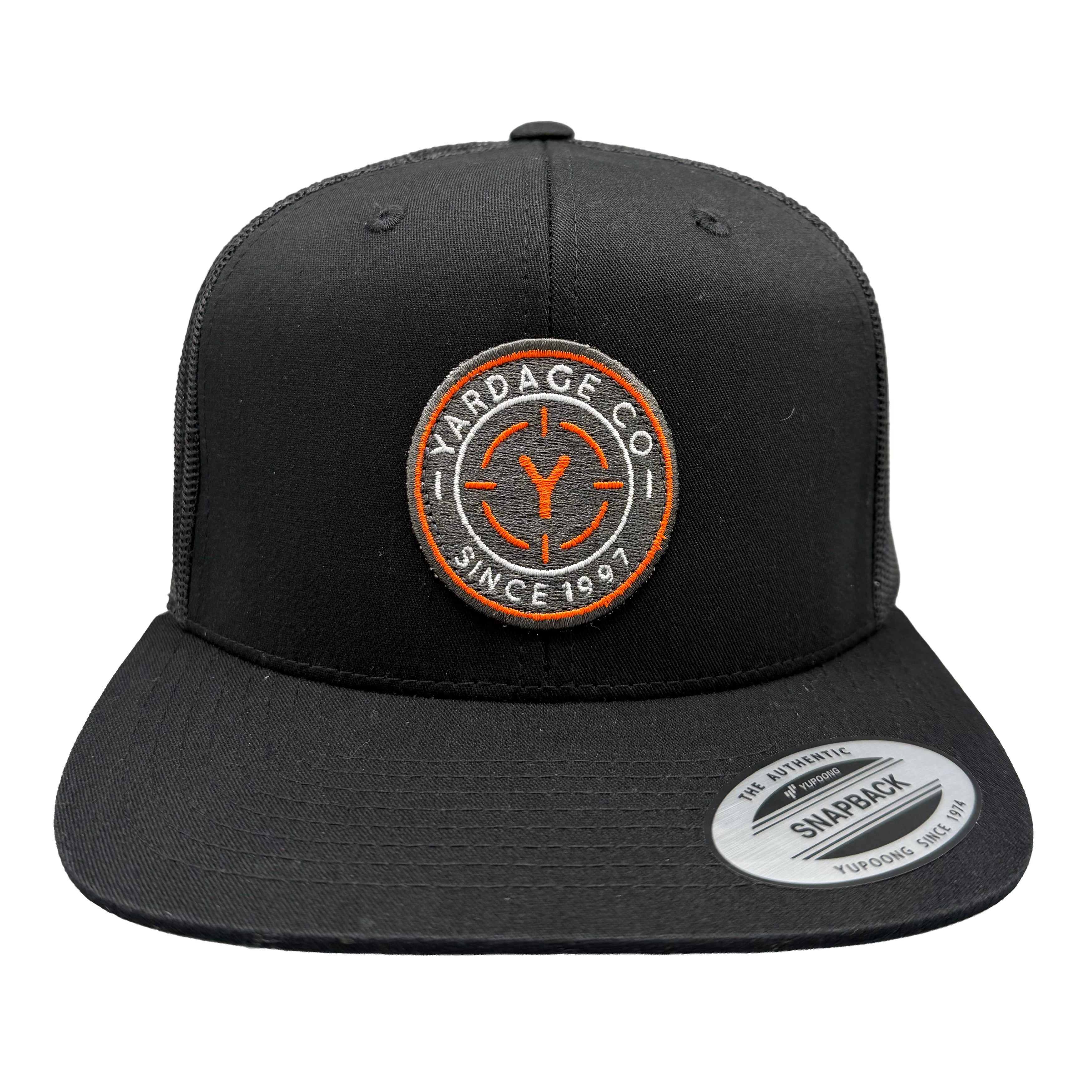 Black cap with a yardage circular logo and text on a white background